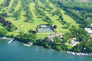 Country club with golf course on lake